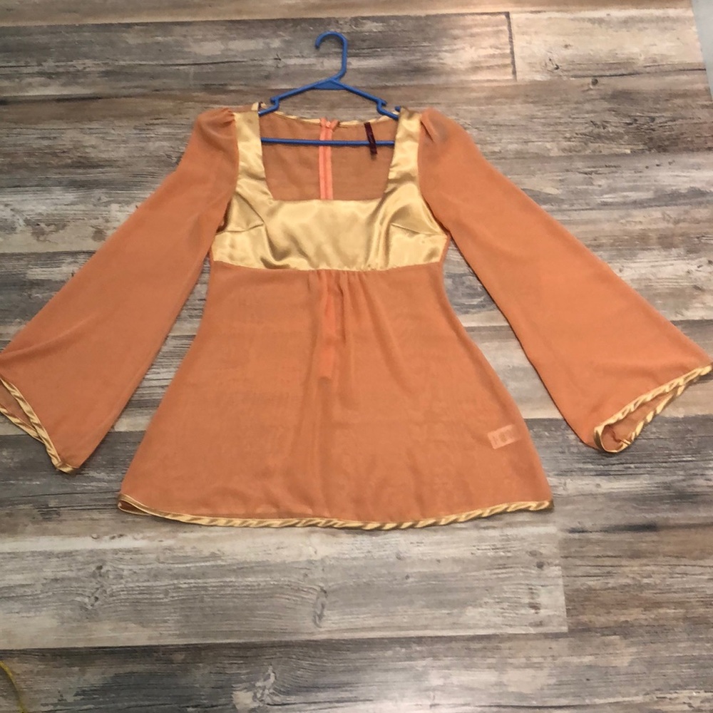 Orange and gold women’s dressy top